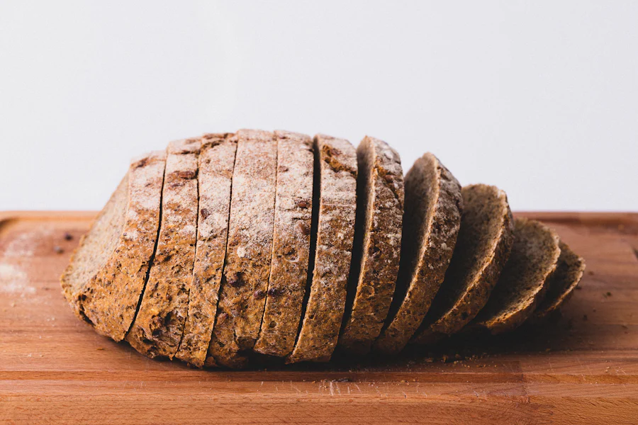 A sliced rye loaf on a board